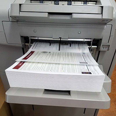 photo of newsletter printing off machine