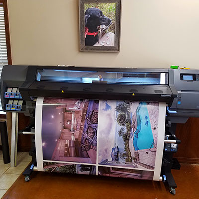 photo of banner printing off latex printer
