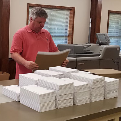 photo of Bruce working on print job